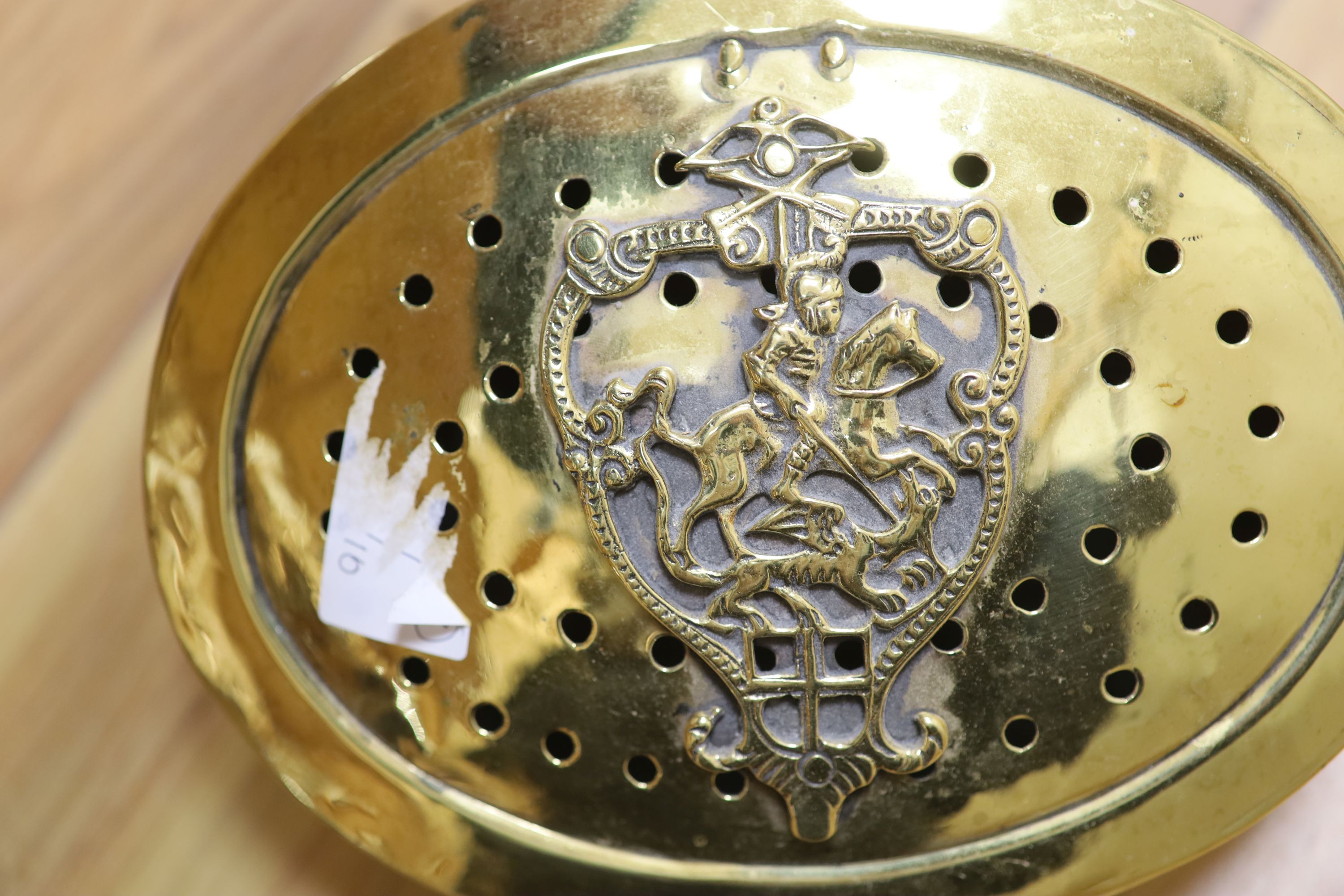 A 19th century oval brass planter and chestnut roaster